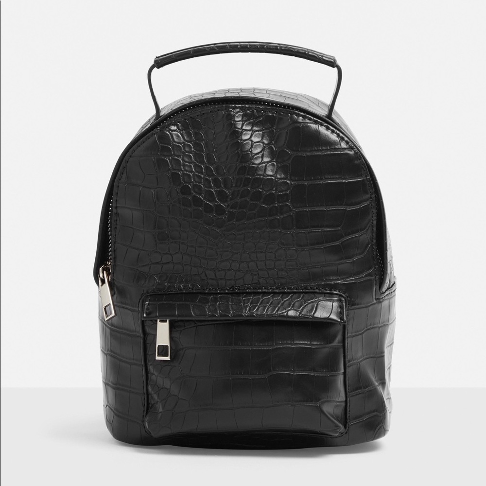 faux leather crock backpack